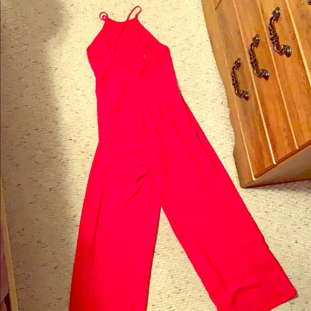 Run jumpsuit! Beautiful on!! Open back